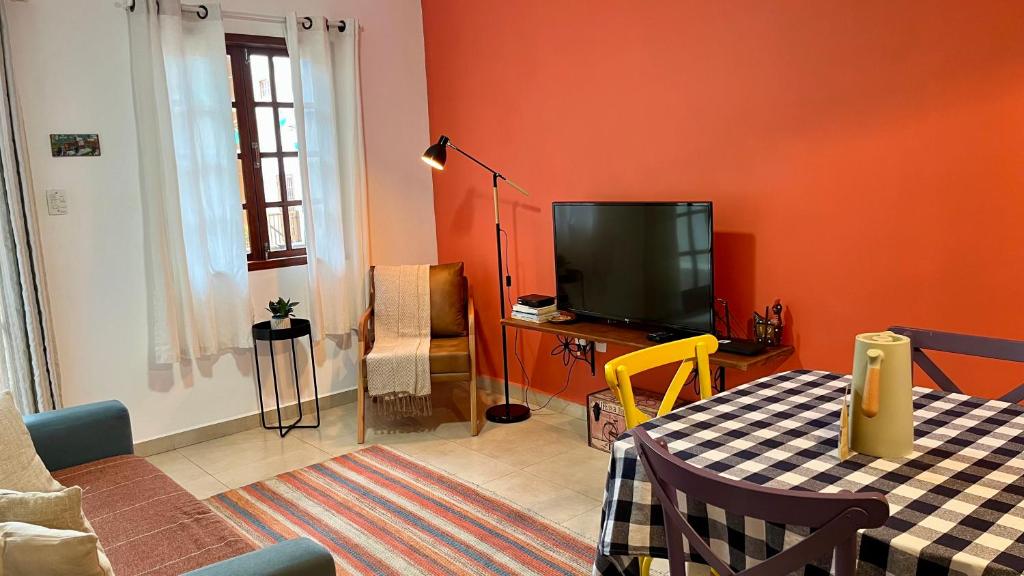 TV a/nebo společenská místnost v ubytování Apartamento Chapada Diamantina