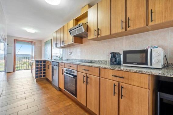 Kuchyň nebo kuchyňský kout v ubytování Casa el Ferrer