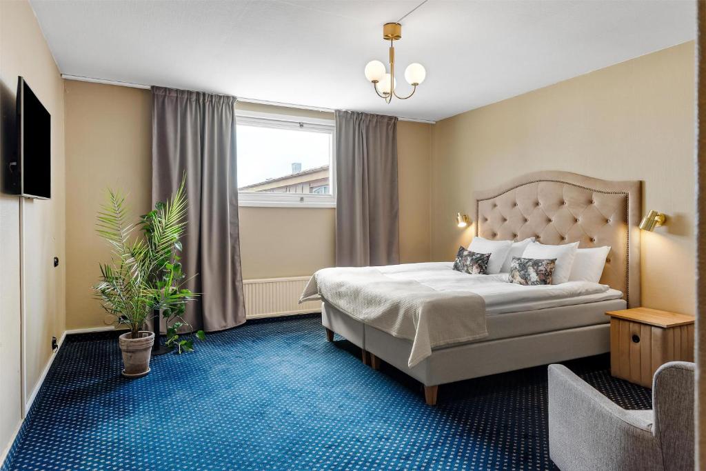 Postel nebo postele na pokoji v ubytování Karlskrona Stadshotell, Best Western Signature Collection
