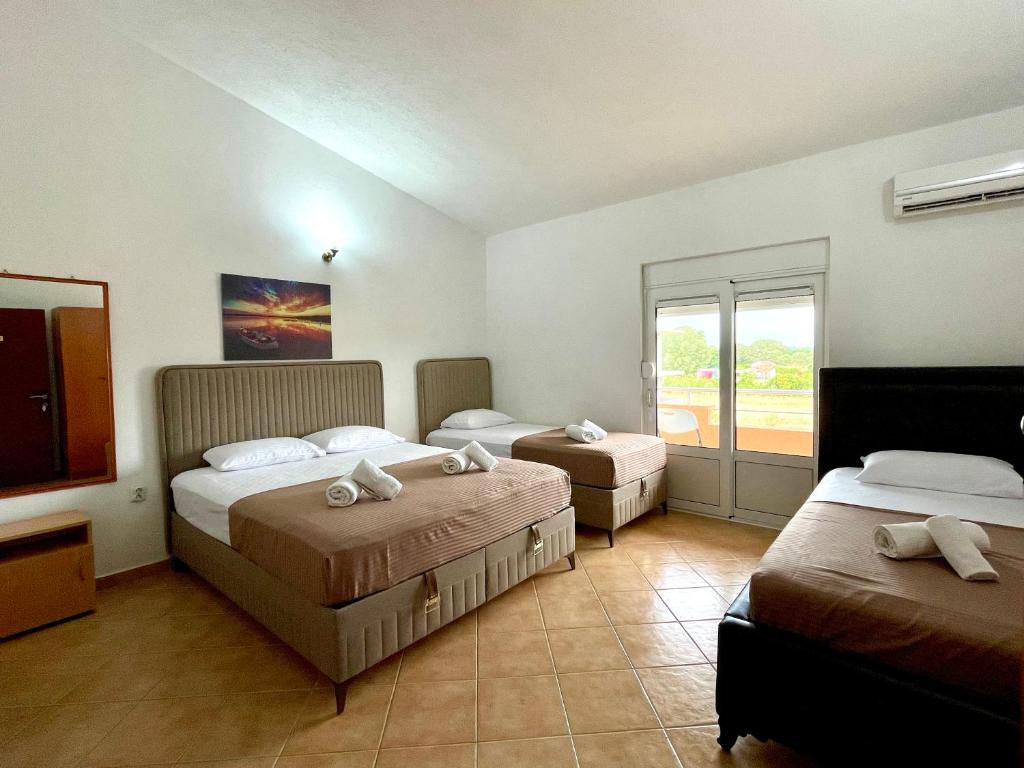 Postel nebo postele na pokoji v ubytování Holiday House