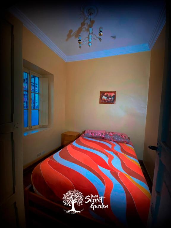 Cama o camas de una habitación en Secret Garden