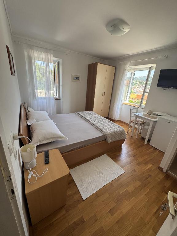 Voodi või voodid majutusasutuse Studio Appartment & Rooms Old Town toas