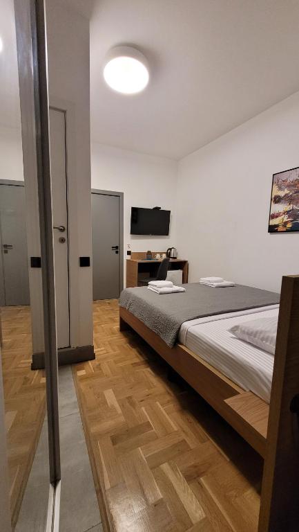 Postel nebo postele na pokoji v ubytování Pri Rooms