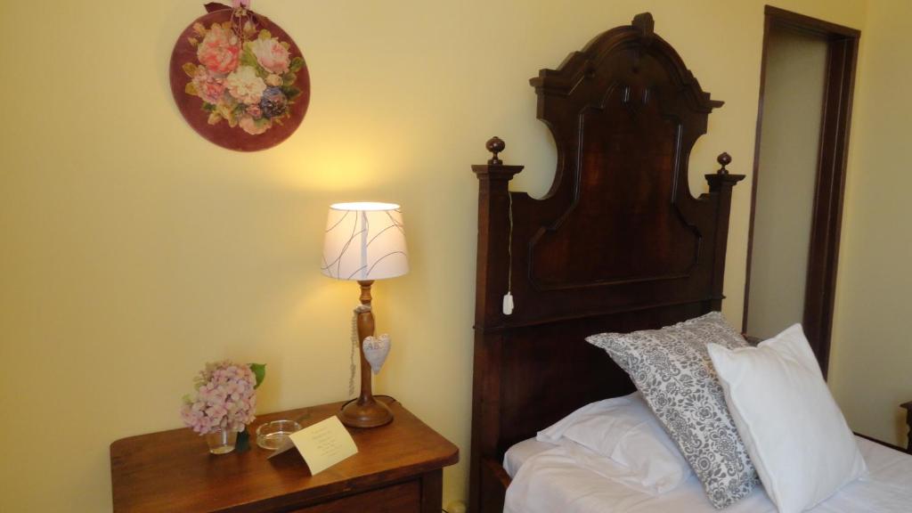 Postel nebo postele na pokoji v ubytování Albergo & Ristorante Selvatico