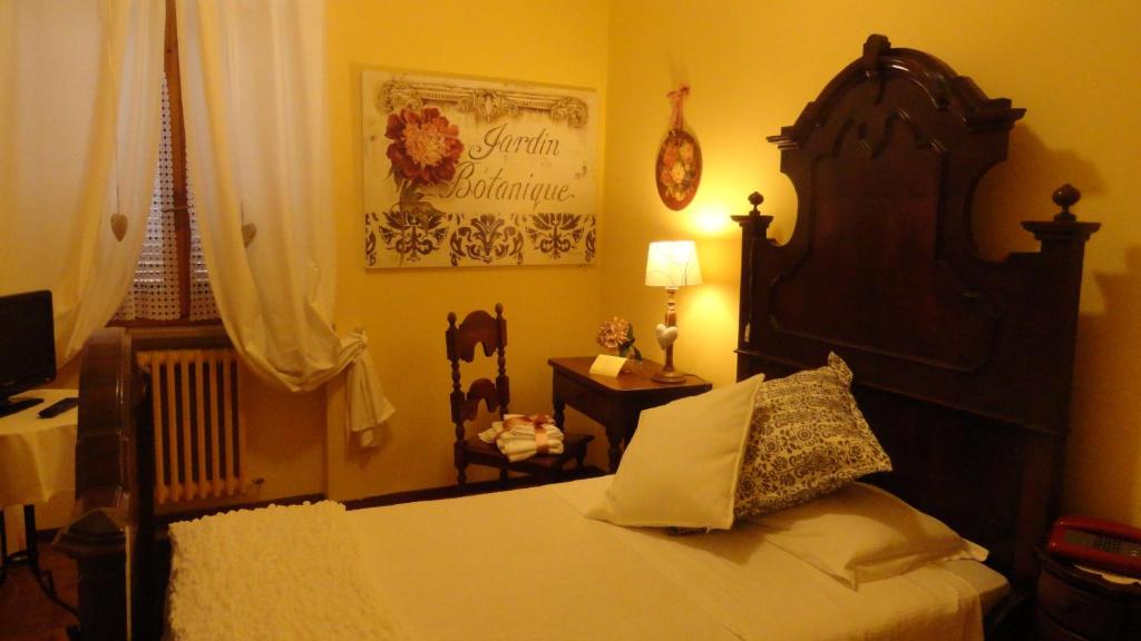 Postel nebo postele na pokoji v ubytování Albergo & Ristorante Selvatico