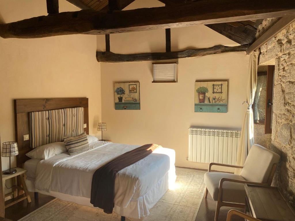 Postel nebo postele na pokoji v ubytování Hotel Rural Casal do Mouro