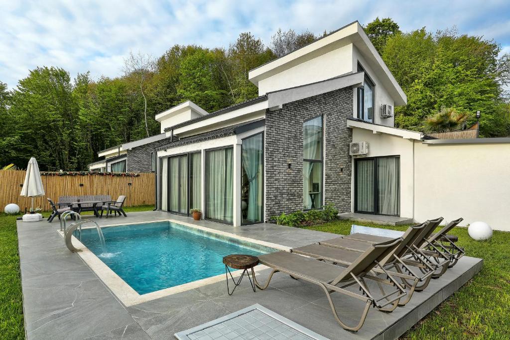 Bazén v ubytování New Balturk Nature Villas nebo v jeho okolí