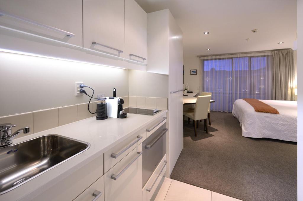 Kuchyň nebo kuchyňský kout v ubytování Palazzo Motor Lodge