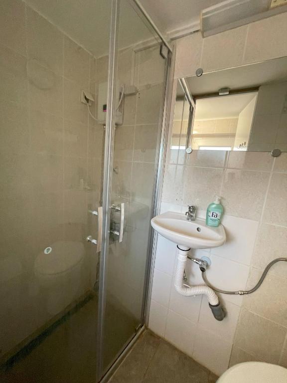 Koupelna v ubytování Planinski dom Janče