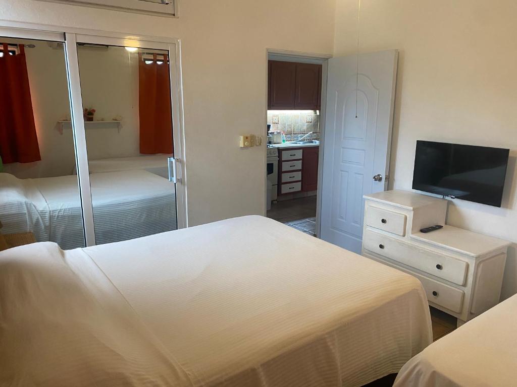 Postel nebo postele na pokoji v ubytování Cita del Sol City Apartments