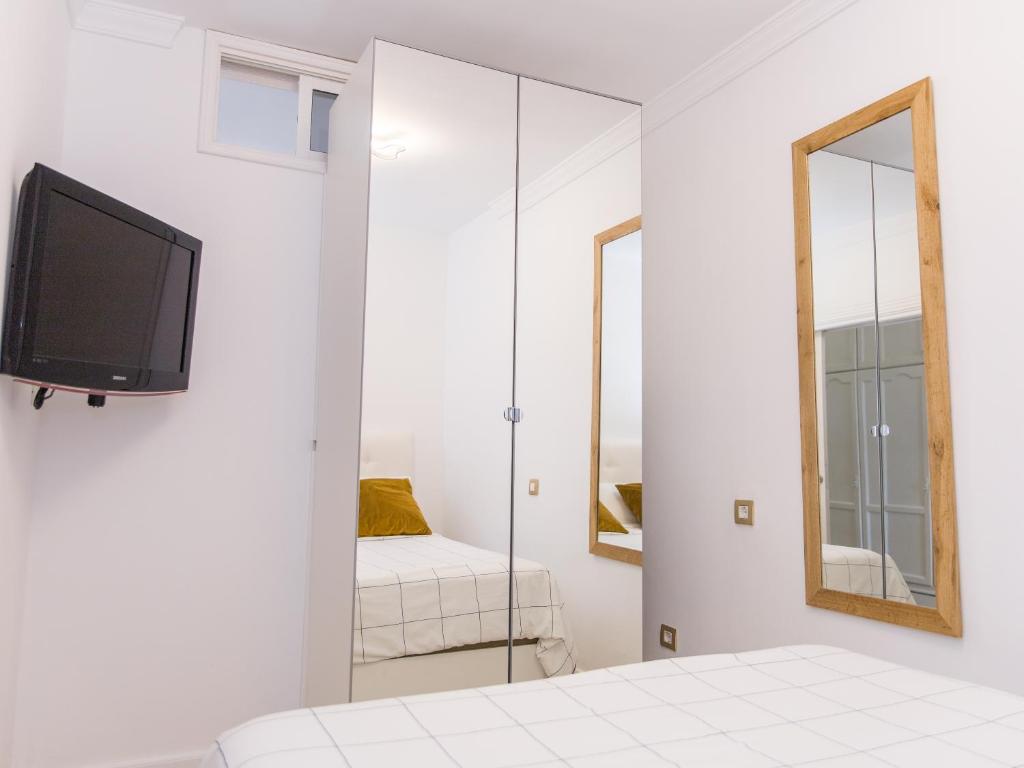 Posteľ alebo postele v izbe v ubytovaní Luxury ocean view apartment costa adeje