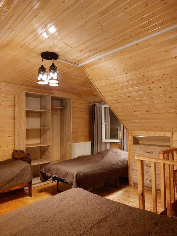 Postel nebo postele na pokoji v ubytování Hotel alisa in racha