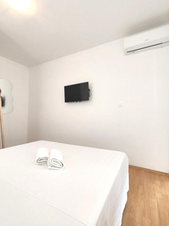 TV a/nebo společenská místnost v ubytování Apartments Lucerna