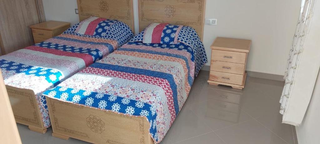 Postel nebo postele na pokoji v ubytování Saidia caracas