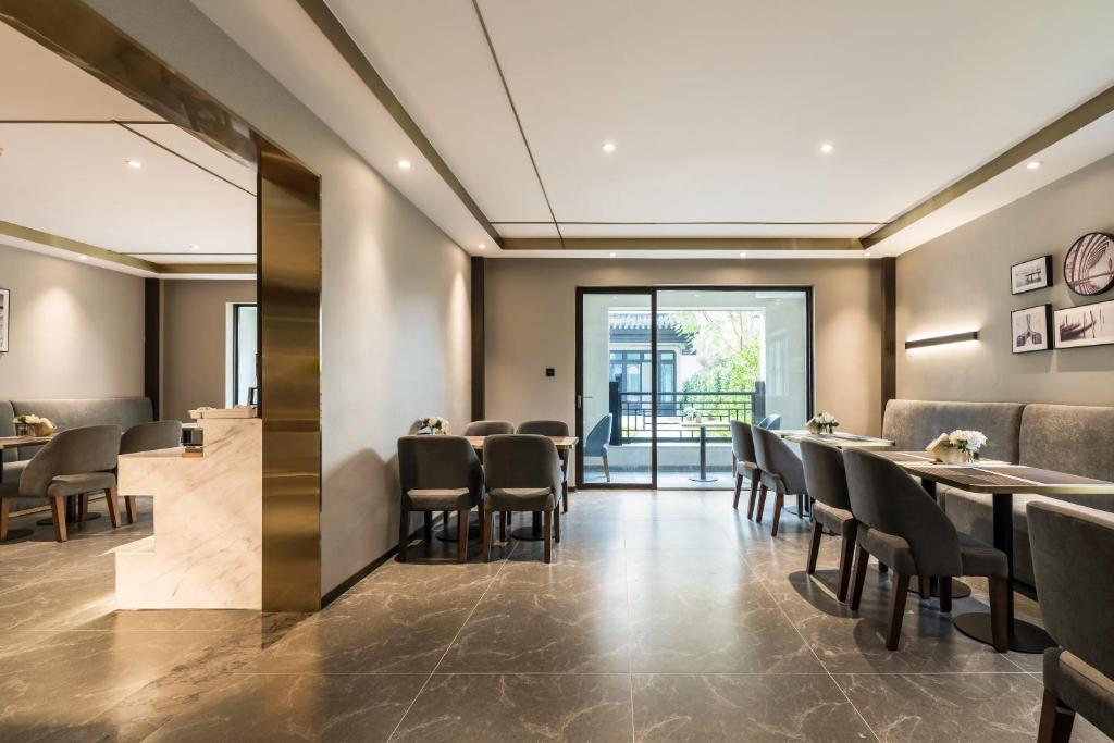 Posezení v ubytování Poltton Century Hotel - Changtai Taoli Chunfeng Branch
