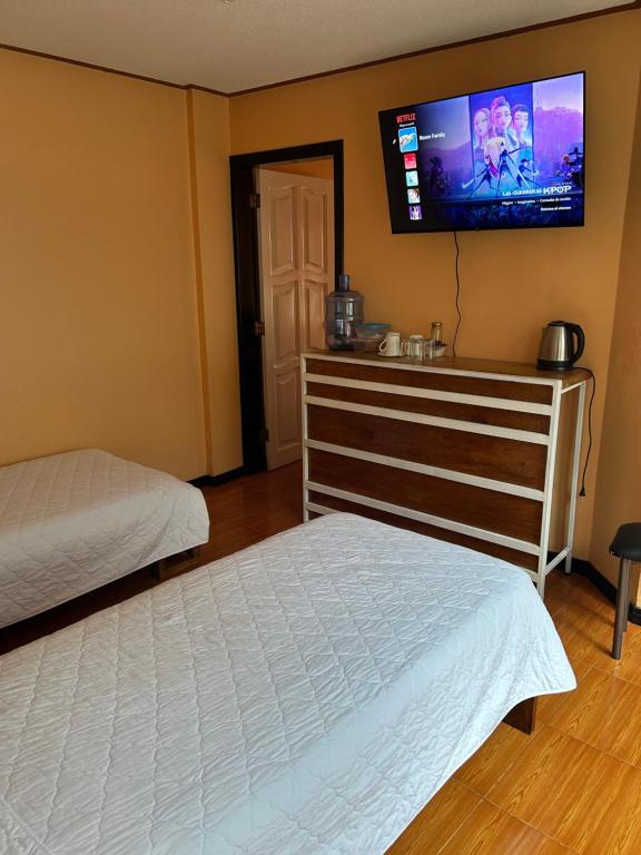 Postel nebo postele na pokoji v ubytování Hospedaje SOL DE VERANO