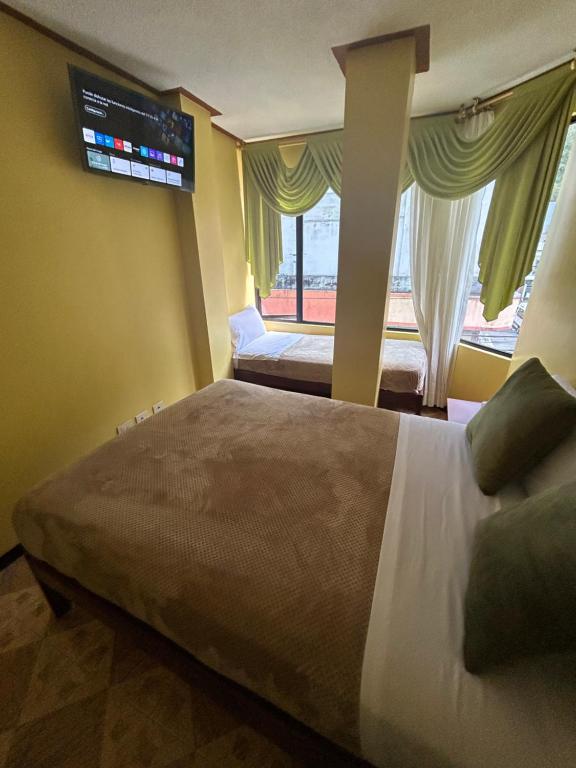 Postel nebo postele na pokoji v ubytování Hospedaje SOL DE VERANO
