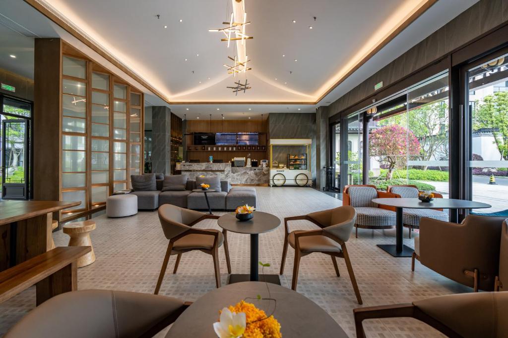 Posezení v ubytování Poltton Century Hotel - Changtai Taoli Chunfeng Branch