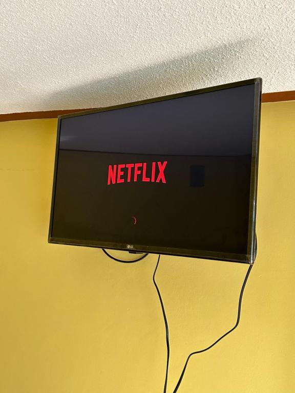 TV a/nebo společenská místnost v ubytování Hospedaje SOL DE VERANO