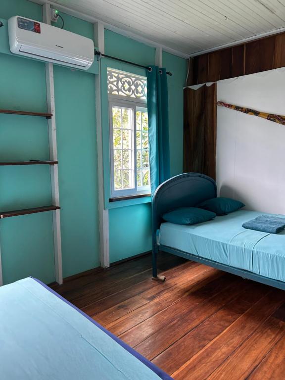 Una cama o camas en una habitación de Old Bocasso