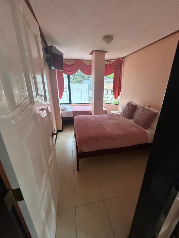 Postel nebo postele na pokoji v ubytování Hospedaje SOL DE VERANO