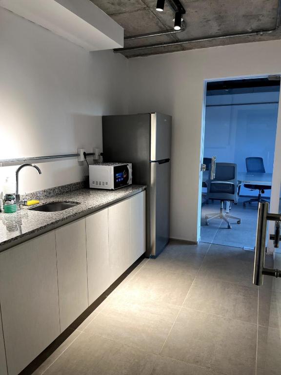 Kuchyň nebo kuchyňský kout v ubytování Departamento amoblado en Luque