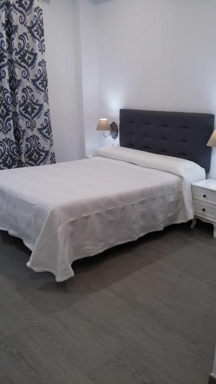 Postel nebo postele na pokoji v ubytování Hostal Boutique Bajamar