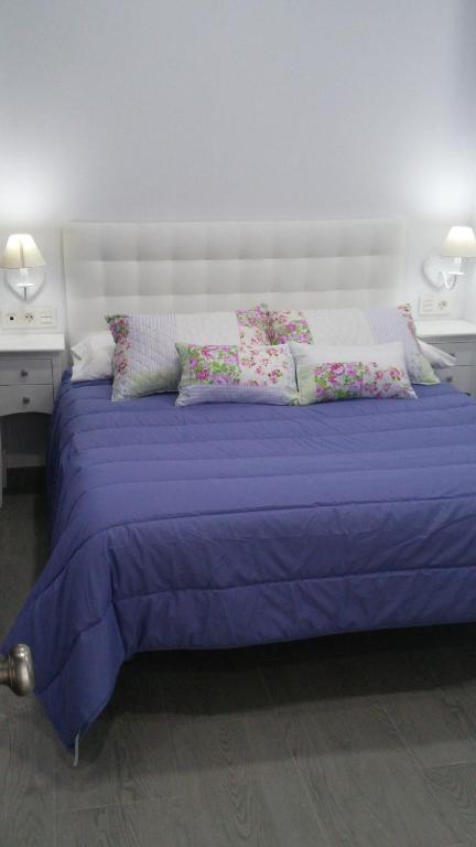 Postel nebo postele na pokoji v ubytování Hostal Boutique Bajamar