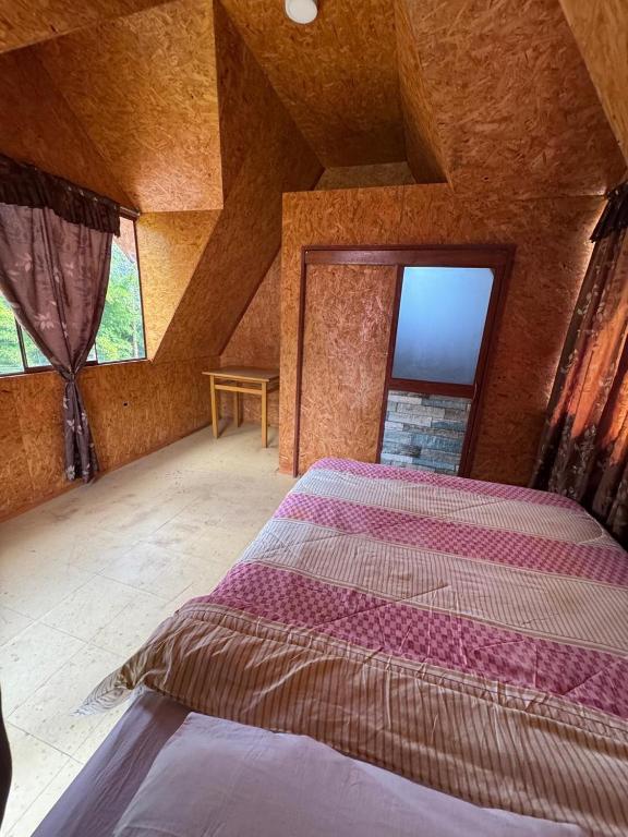 Postel nebo postele na pokoji v ubytování iainn