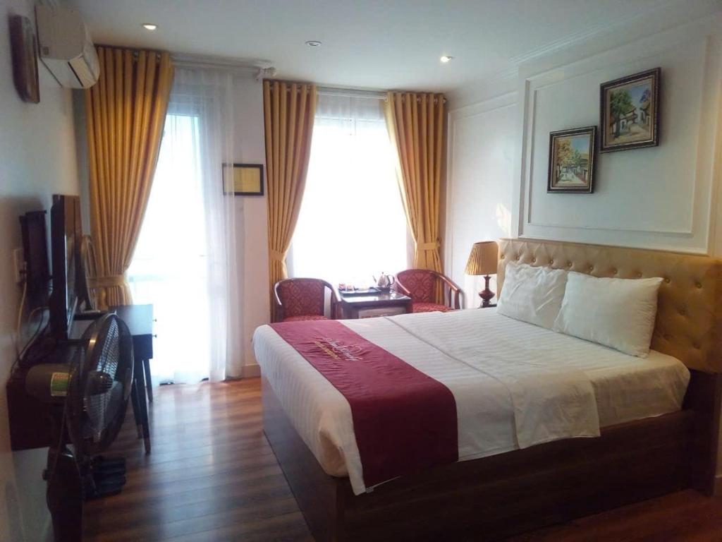 TV a/nebo společenská místnost v ubytování New Amely Hotel