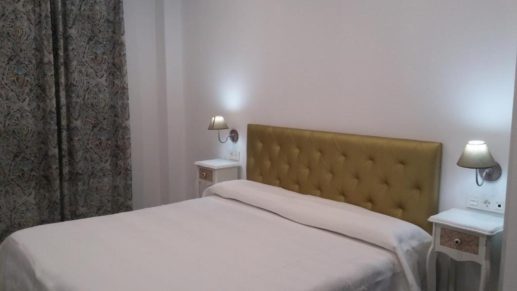 Postel nebo postele na pokoji v ubytování Hostal Boutique Bajamar