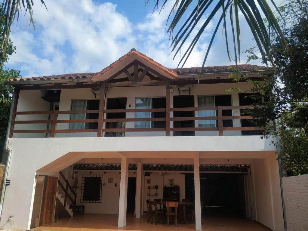 a house with the front of it at Hostal Landivar - A media cuadra de la plaza in Buena Vista