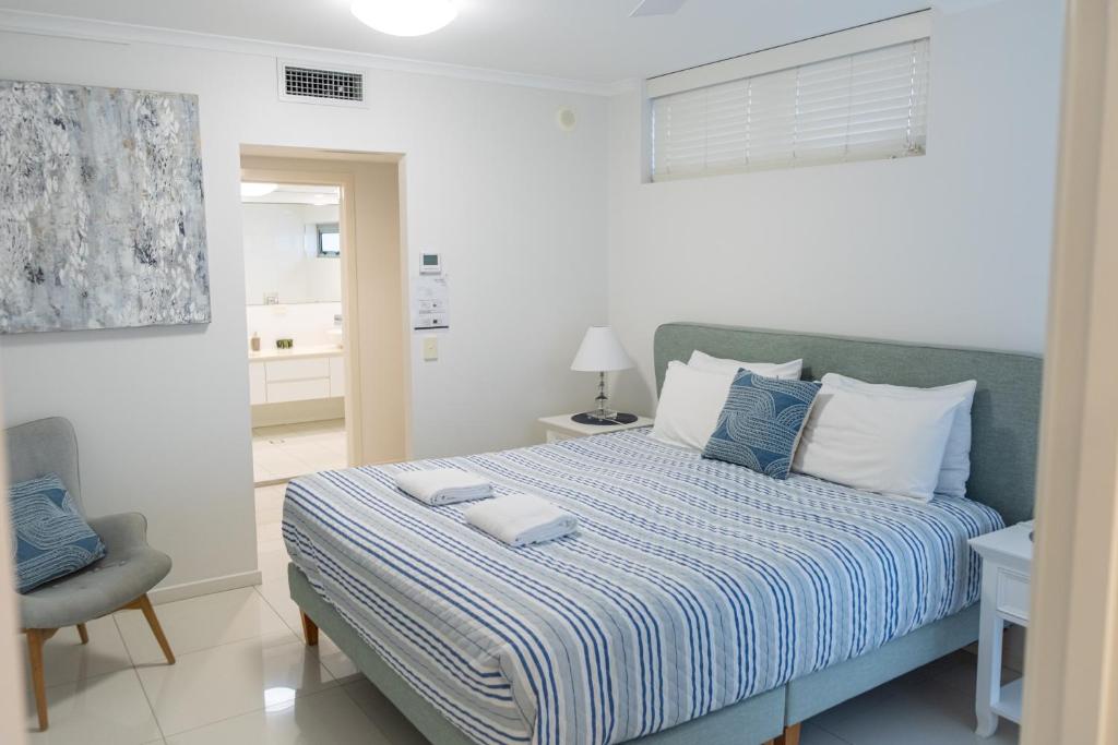 Postel nebo postele na pokoji v ubytování Kings Edge Holiday Apartments