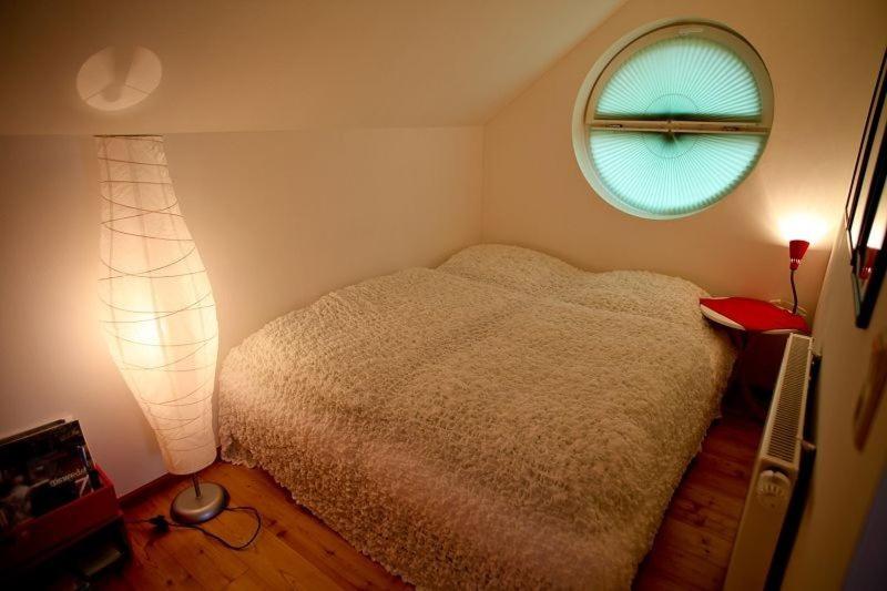 Postel nebo postele na pokoji v ubytování Ferienhaus Kastaniengrün