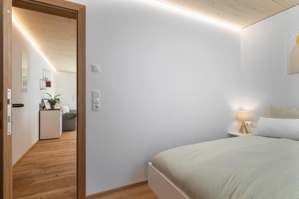 Postel nebo postele na pokoji v ubytování KopfRausch Appartements