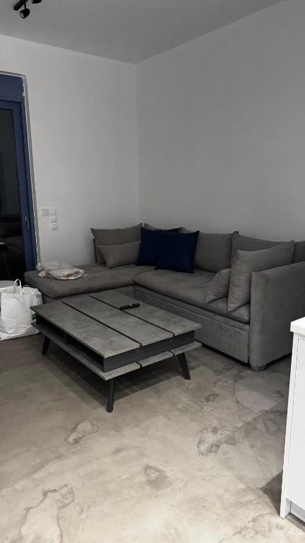 A seating area at NV seafront Villa Aegina