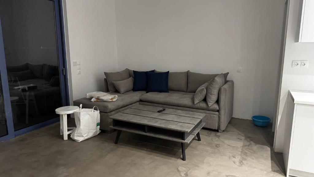 A seating area at NV seafront Villa Aegina