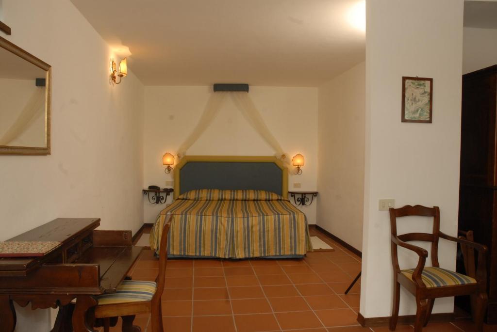 Posteľ alebo postele v izbe v ubytovaní Relais Borgo Di Toiano