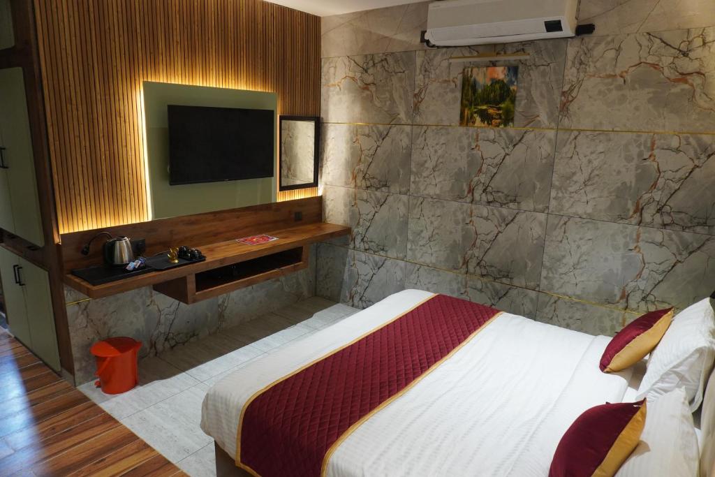 TV a/nebo společenská místnost v ubytování Hotel Pandian