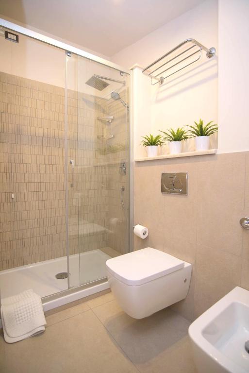 Ванная комната в Taonasi Mazzarò Apartments