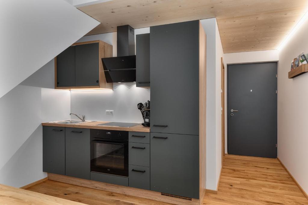 Kuchyň nebo kuchyňský kout v ubytování KopfRausch Appartements