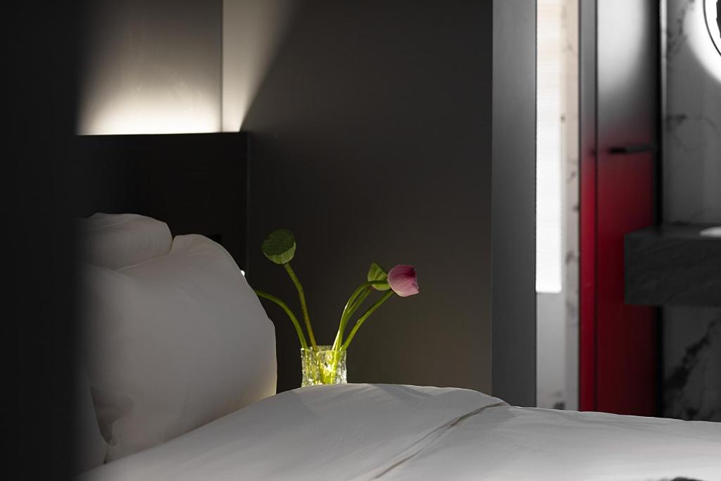Postel nebo postele na pokoji v ubytování Enji M Hotel-Xi’an datangbuyecheng