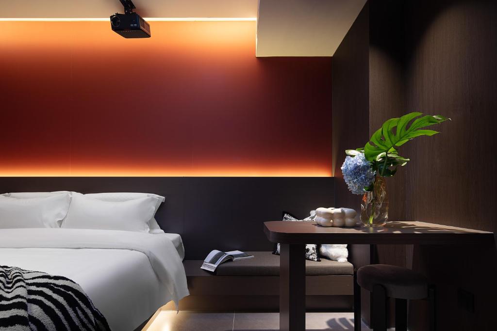 Postel nebo postele na pokoji v ubytování Enji M Hotel-Xi’an datangbuyecheng