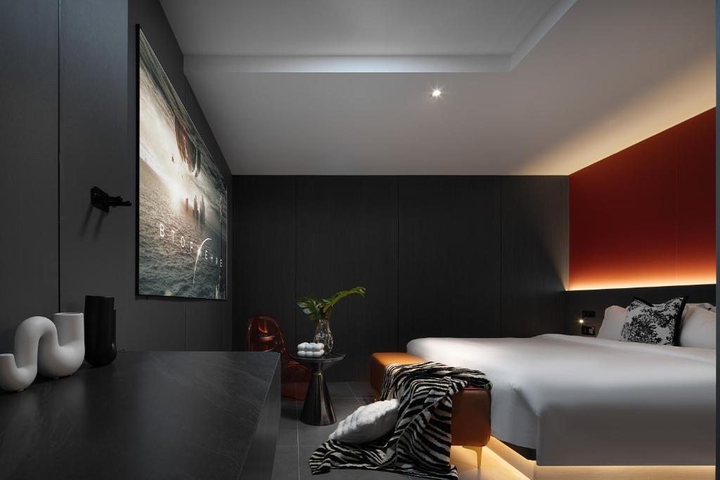 Postel nebo postele na pokoji v ubytování Enji M Hotel-Xi’an datangbuyecheng