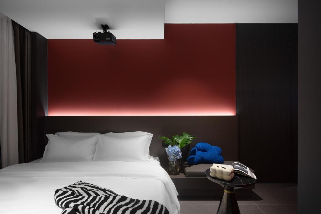 Postel nebo postele na pokoji v ubytování Enji M Hotel-Xi’an datangbuyecheng