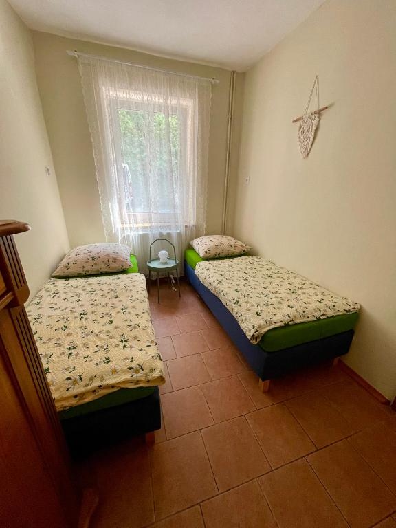 Postel nebo postele na pokoji v ubytování Bros