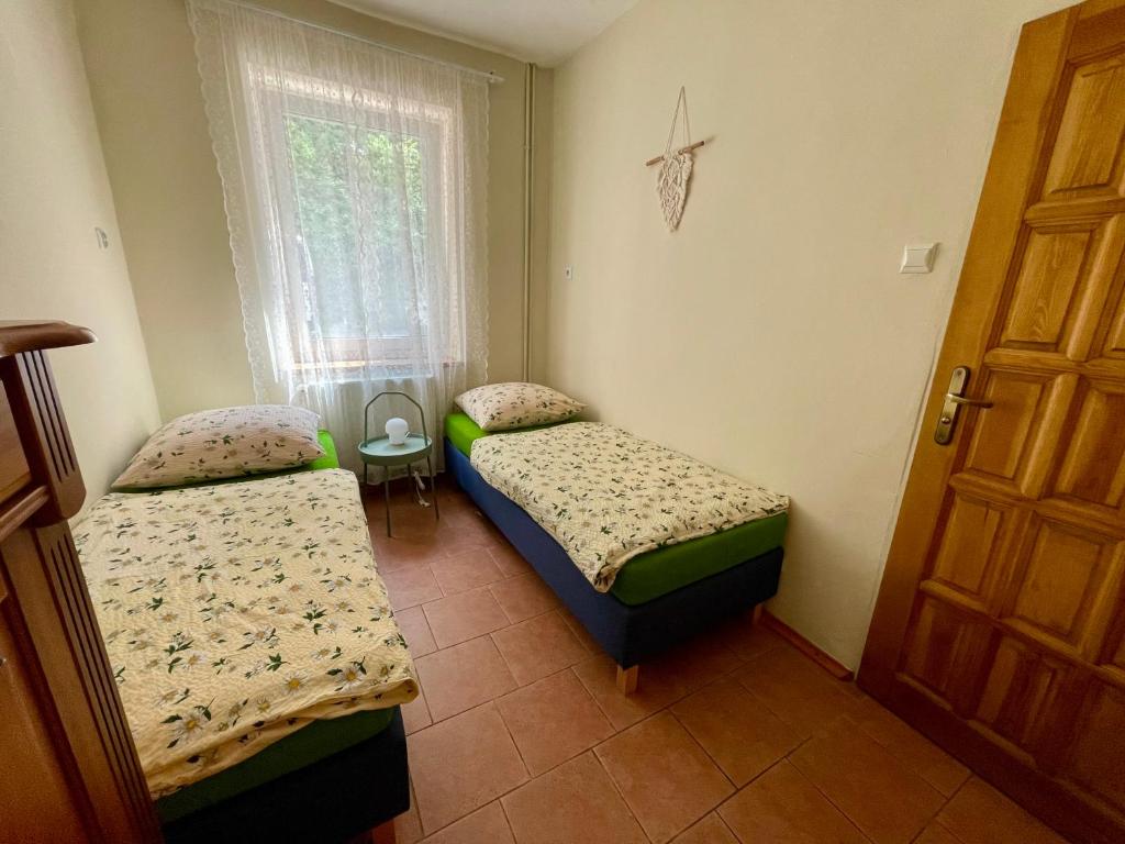 Postel nebo postele na pokoji v ubytování Bros