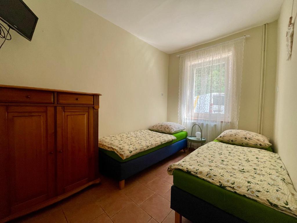 Postel nebo postele na pokoji v ubytování Bros