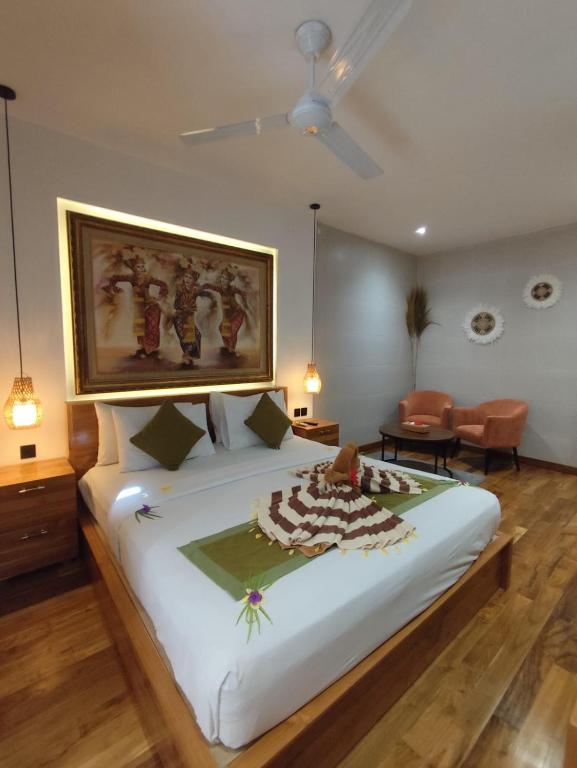 Postel nebo postele na pokoji v ubytování Jungle Haven Resort Central Ubud