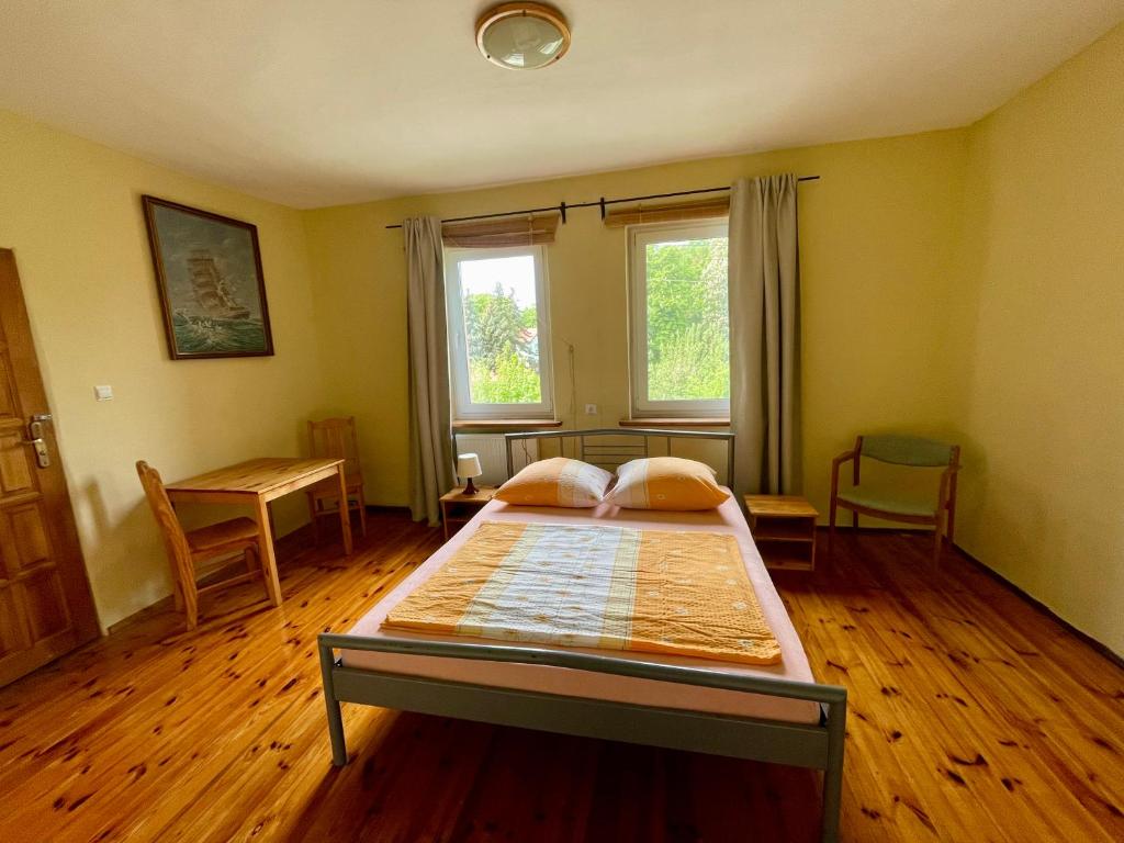 Postel nebo postele na pokoji v ubytování Bros
